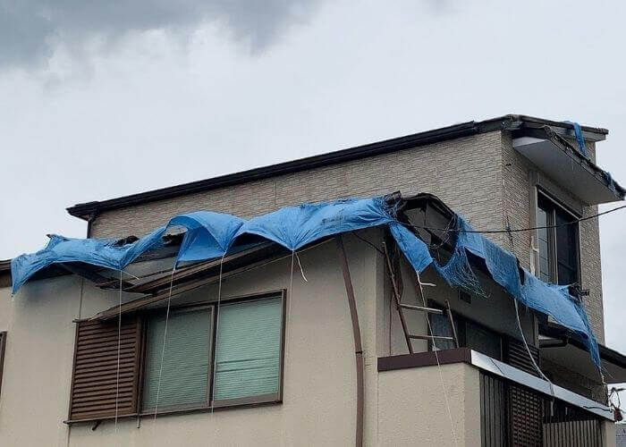 台風被害を受けた家